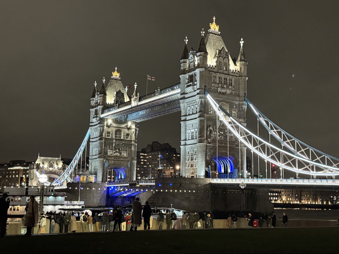 Tower Bridge lit up at night, London
