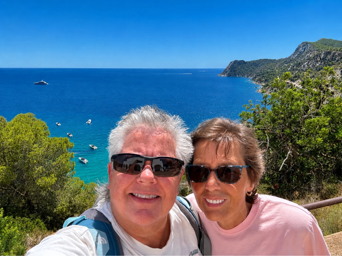 Anne Conrad and her wife Kathy overlooking the coast of Ibiza